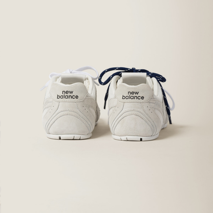 NB (WMNS) x Miu Miu 530 SL White suede and mesh sneakers